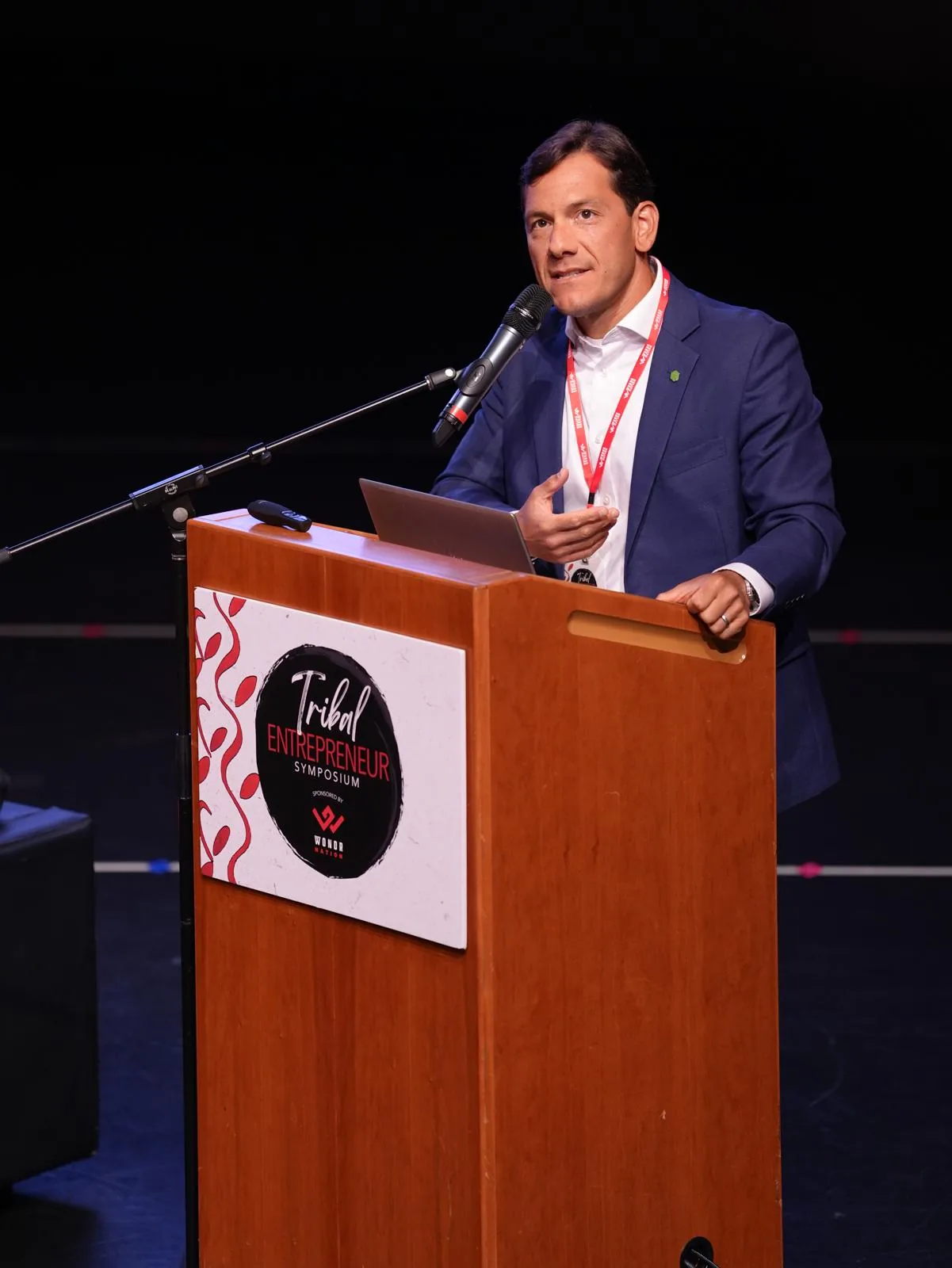 Speaker at a conference podium — corporate event photography in Connecticut